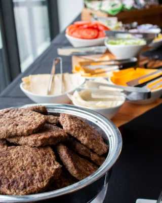 Celebrate life's special moments with ease! 🎉 From graduation parties to baby showers, Black Woods Group Catering has you covered. Let us handle the food while you enjoy the festivities! 🍽️ 
📸: BYO Burger Bar – a guest favorite!