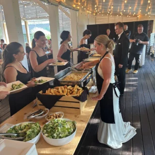And the coolest couple award goes to... 🥁🏆!!
After being in the industry for almost 3 decades, there are very few things we haven't seen before. But Lilly and Tyler blew us away this weekend ❤️. As part of dinner service, they asked to be a part of serving their guests to have an opportunity to see everyone, say hello, and individually thank them for being a part of their special day. WOW! This is something that rings so true to the core of what we are at Black Woods... our love language is service - and serving something as simple but intimate as a meal. 
Plus, we think those catering aprons look pretty dang good on them 😉.
Thank you Lilly and Tyler for choosing Black Woods and for sharing this moment with us.. this is one we won't soon forget. Cheers to the newlyweds!